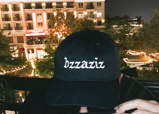 black hat that says bzzaziz