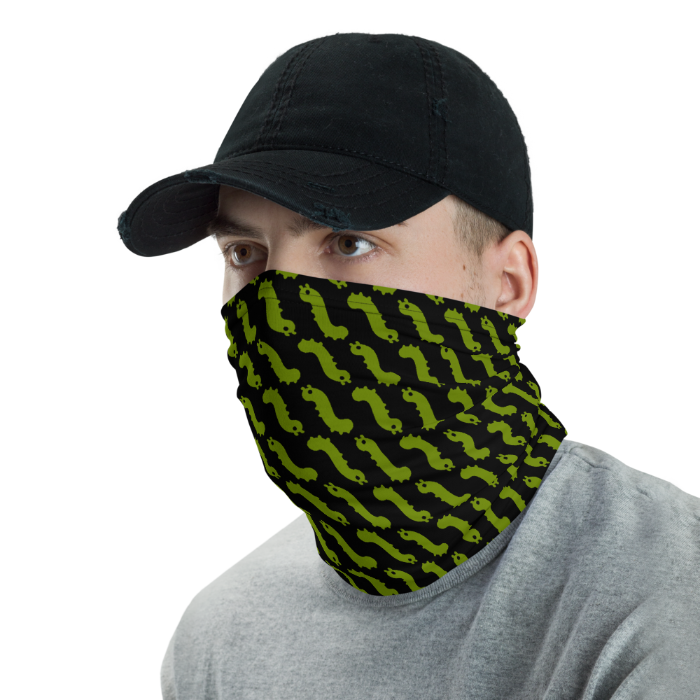 man in hat wearing pull up gaiter style face mask with repeating green bug emoji pattern