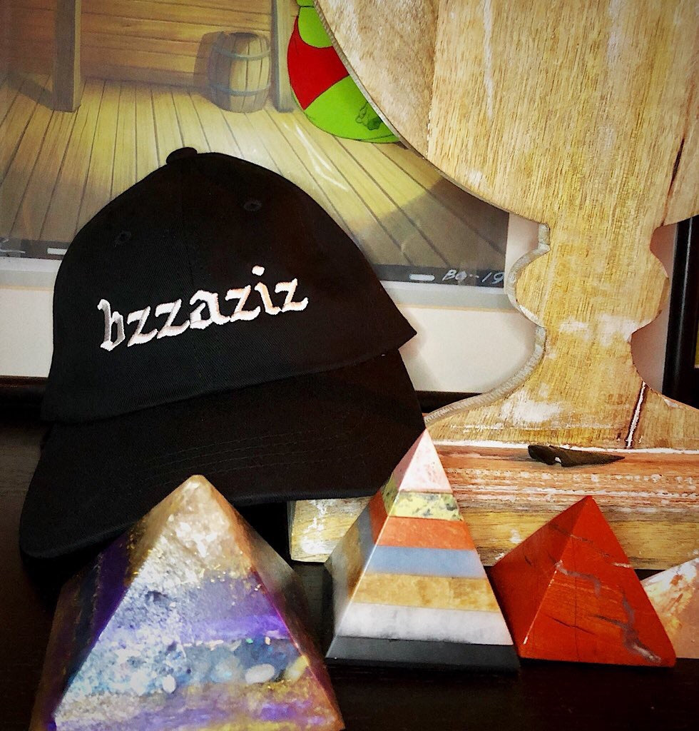 black hat that says bzzaziz