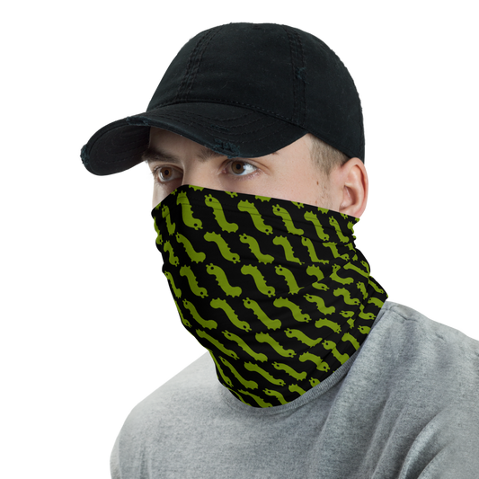 man in hat wearing pull up gaiter style face mask with repeating green bug emoji pattern