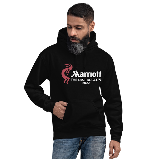 black man with one hand in the pocket of a black hoodie featuring an image of Kokopelli, the Marriott logo and the words The Last Bug Con